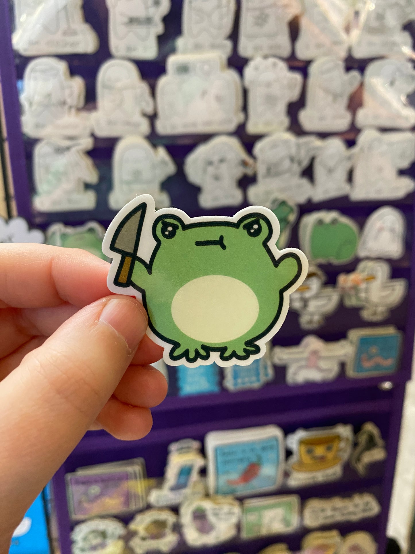Froggo with a knife sticker